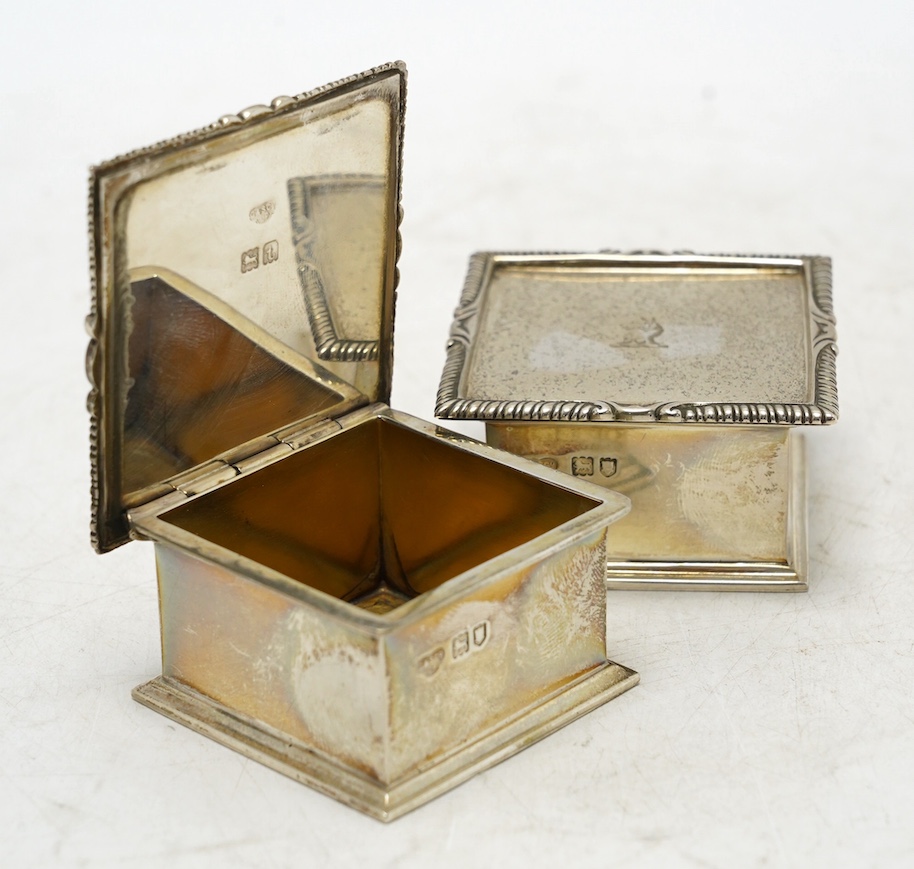 A pair of George V silver square boxes with hinged covers, by Goldsmiths & Silversmiths Co Ltd, London, 1914, 59mm, 7.2oz. Condition - good